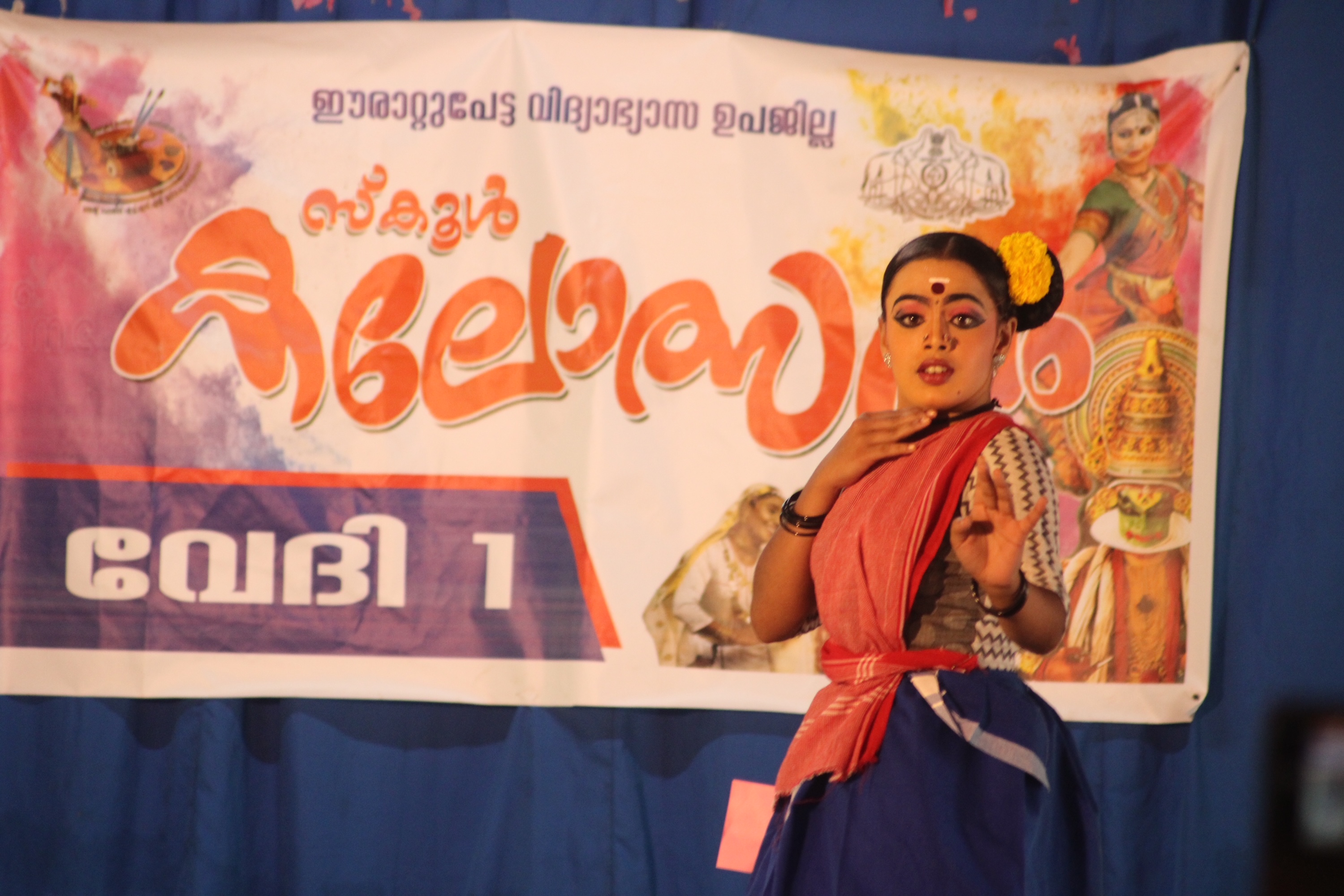 Student performing classical dance in traditional costume